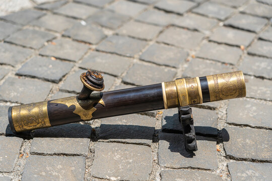 The ancient smoking pipe for opium on the sidewalk, Da Nang, Vietnam