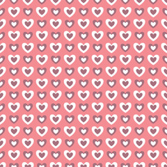 Valentine's Day hand drawn seamless pattern of cute heart shapes, love symbol. Abstract pink romantic doodle sketch illustration for greeting card, invitation, wallpaper, wrapping paper, fabric