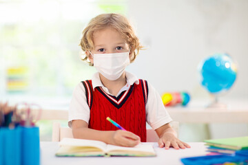 Kids in face mask. Child in school.