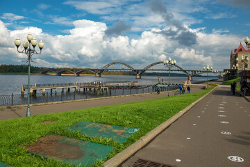 Panorama of the Volga embankment and a road bridge across the Volga river in the city of Rybinsk