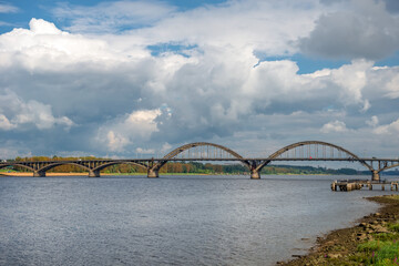 Panorama of the Volga embankment and a road bridge across the Volga river in the city of Rybinsk