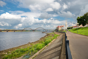 Panorama of the Volga embankment and a road bridge across the Volga river in the city of Rybinsk