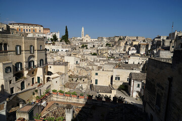 Obraz premium Sassi di Matera ancient site aerial panoramic cityscape, popular tourist travel place, guided tour concept, Basilicata, Italy