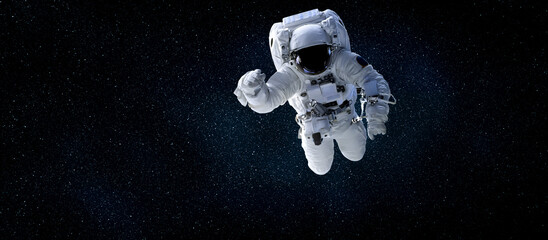 Astronaut-ruimtevaarder doet ruimtewandeling terwijl hij voor een ruimtestation in de ruimte werkt. Astronaut draagt een volledig ruimtepak voor ruimteoperaties. Elementen van deze afbeelding geleverd door NASA-ruimteastronautenfoto's.