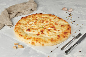 Ossetian pie with cheese and green