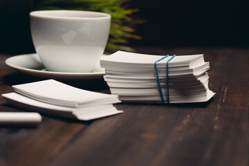 coffee cup on the table business cards office desktop business