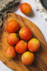 tomatoes on a chopping board