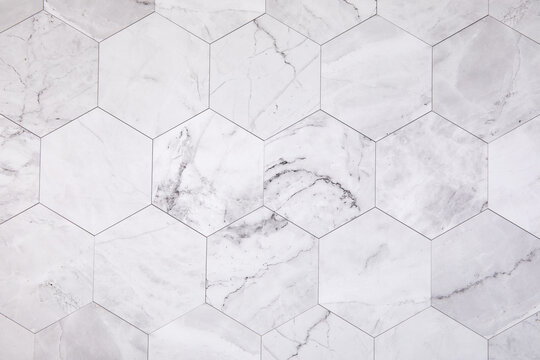 Closeup of the white marble wall with hexagon tiles for texture and background
