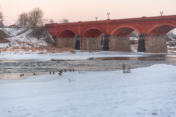 ancient stone, brick bridge and ducks