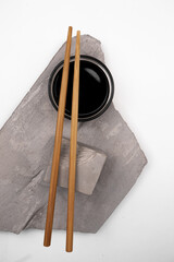 Japanese sushi chopsticks and sauce bowl. tasty soy sauce. Chopsticks.