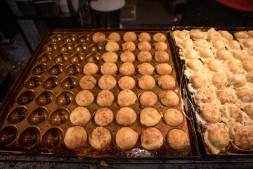 Fresh takoyaki on the street of Osaka, Japan.
