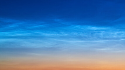 Fototapeta premium White Spindrift clouds on blue sky