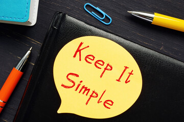 Business concept about Keep It Simple with inscription on the sheet.