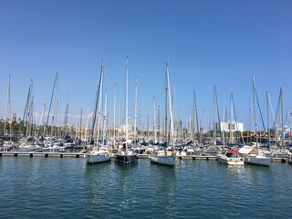 Fototapeta na wymiar View of sailing boats in the port of Barcelona, Spain