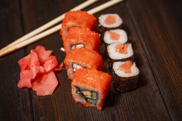 sushi rolls wooden sticks seafood filling delicacy asian food