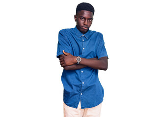 Young african american man wearing casual clothes skeptic and nervous, disapproving expression on...