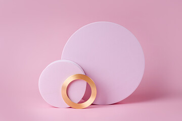 Pink rounds with golden ring on a pastel  background. Stylish background for presentation.
