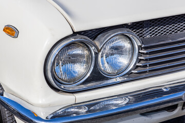Fototapeta premium 自動車のヘッドライト Headlight of the old car