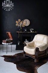 Retro vintage interior. Retro living room interior in dark black colors. Retro leather chair and fireplace