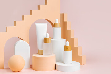 Various blank cosmetic container mock-ups on podiums and geometrical forms. Background for branding...