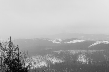 Mountains in fog in cloudy weather