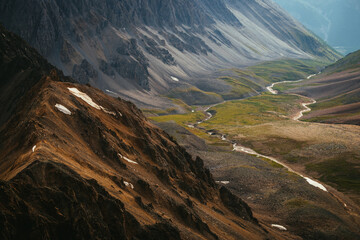 Scenic mountain landscape of motley mountain valley with river. Wonderful view from sharp mountain...