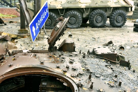 Donetsk city in Ukraine, armed conflict, military operations, Escalation in Donbas, vehicle wreck, armored,