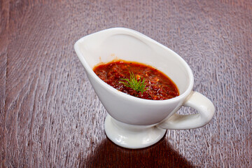 Caucasian traditional Adjika sauce in the bowl