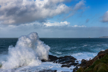 Rough seas on St Ives Head, aka The Island, St. Ives, Cornwall, UK