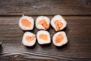 with sushi chopsticks ginger delicacy wooden background meal