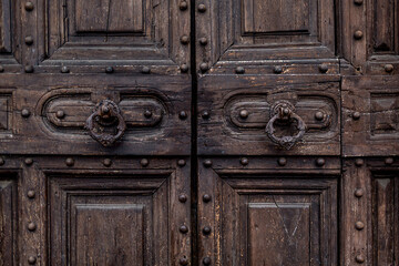 Dirty broken mystical gateway. Messy uneven facade of cracked wood panels in rural town. Fractured retro castle doorway. Flaked grungy slats of barn shabby gate. Destroyed grimy entry of rustic ranch