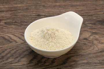 Wheat flour heap in the bowl