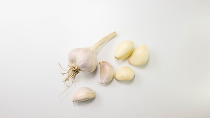Fresh garlic on white background