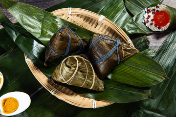 Dragon Boat Festival ,Chinese rice dumpling zongzi on reed leaves 