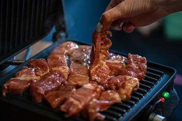Cooking grilled meat at home