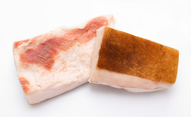 raw lard two pieces on white background, pork fat