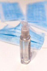 hand antiseptic and medical mask