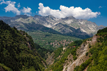 Fototapeta na wymiar View of the Tzoumerka Mountains and the traditional village of Theodoriana in Epirus, Greece
