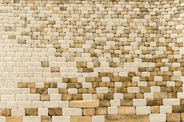 Side wall of the Sungnyemun gate, made of big bricks of stone. Seoul, South Korea.