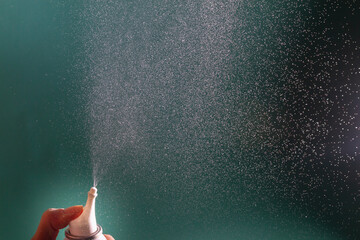 Spray sea water from the nose spray into the air