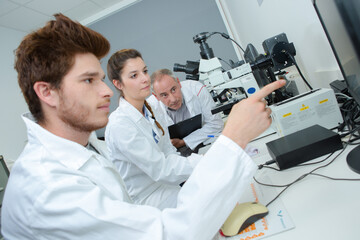 Students sat at desk in laboratory