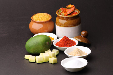 Homemade Mango Pickle or aam ka achar Kairi Loncha with Ingredients.