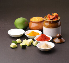 Homemade Mango Pickle or aam ka achar Kairi Loncha with Ingredients.