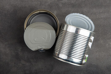 Recycling and ecology concept. Sorting household waste captured from above, flat lay. Grey concrete background