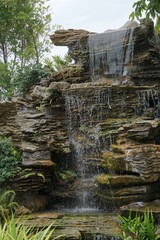 Artificial waterfall of garden in Thailand