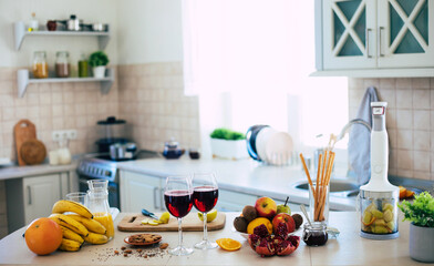 Fresh and ripe fruits composition on the table in the domestic kitchen