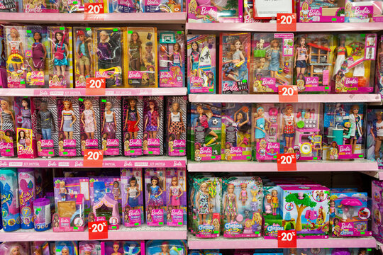 Barbie dolls on the shelves in the store. Large selection of toys for children. Minsk, Belarus - March 2021