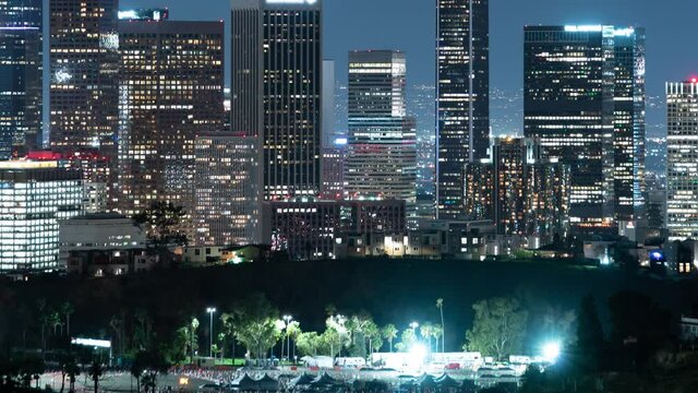 Los Angeles Downtown Buildings Covid Vaccination Site from Angeles Point Elysian Park Night Time Lapse California USA
