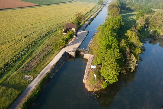Lock of Ravereau seen from the sky in Merry-sur-Yonne , Nivernais canal, in Yonne department , Bourgogne-Franche-comté region, France.