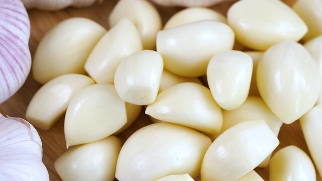 Top view of close up garlic on wooden table